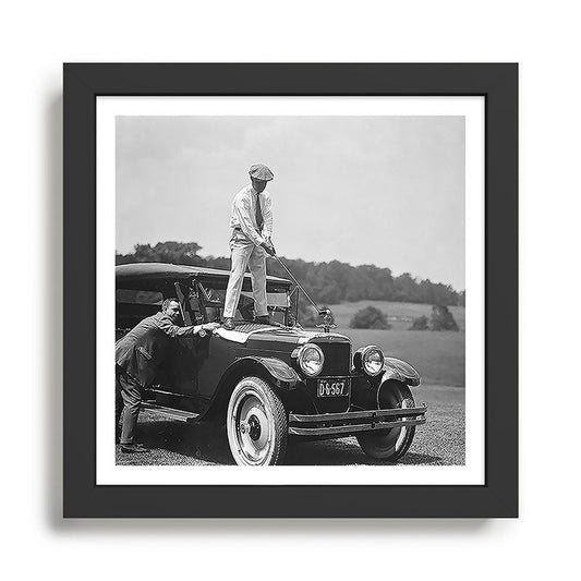 Pro golfer hitting golf ball off vintage car hood ornament on a dare par one 18th hole funny black and white golf sport photograph - photography - photographs Framed Art Print Gallery Image 2