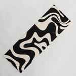 Retro Liquid Swirl Abstract in Black and Almond Cream Yoga Mat Gallery Image 1