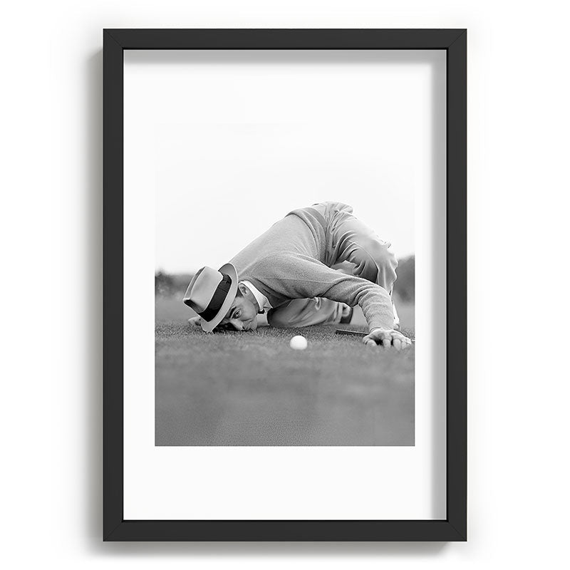 Eye to the ground on the 18th hole; golfing man eyes ball to measure distance to hole vintage black and white portrait photograph - photography - photographs poster Framed Art Print Gallery Image 81