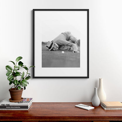 Eye to the ground on the 18th hole; golfing man eyes ball to measure distance to hole vintage black and white portrait photograph - photography - photographs poster Framed Art Print Gallery Image 9
