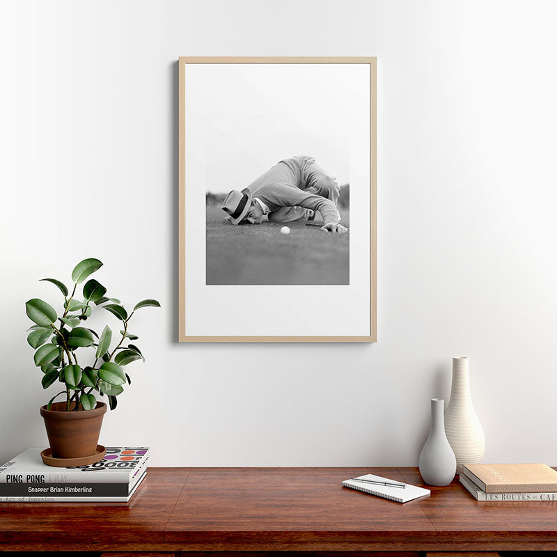 Eye to the ground on the 18th hole; golfing man eyes ball to measure distance to hole vintage black and white portrait photograph - photography - photographs poster Framed Art Print Gallery Image 28