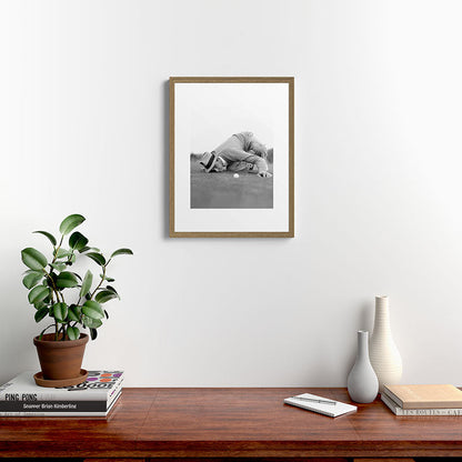 Eye to the ground on the 18th hole; golfing man eyes ball to measure distance to hole vintage black and white portrait photograph - photography - photographs poster Framed Art Print Gallery Image 16