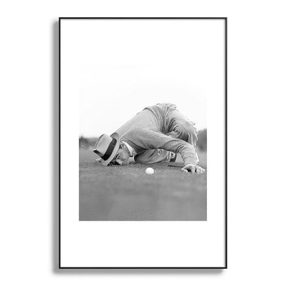 Eye to the ground on the 18th hole; golfing man eyes ball to measure distance to hole vintage black and white portrait photograph - photography - photographs poster Framed Art Print Gallery Image 119