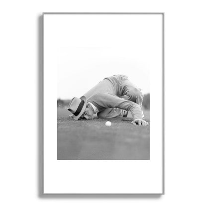 Eye to the ground on the 18th hole; golfing man eyes ball to measure distance to hole vintage black and white portrait photograph - photography - photographs poster Framed Art Print Gallery Image 137