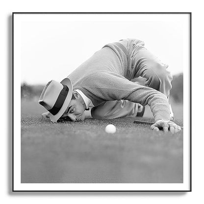 Eye to the ground on the 18th hole; golfing man eyes ball to measure distance to hole vintage black and white portrait photograph - photography - photographs poster Framed Art Print Gallery Image 130