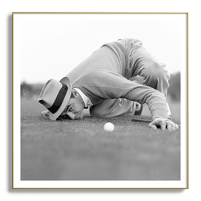 Eye to the ground on the 18th hole; golfing man eyes ball to measure distance to hole vintage black and white portrait photograph - photography - photographs poster Framed Art Print Gallery Image 139