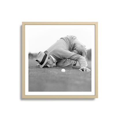 Eye to the ground on the 18th hole; golfing man eyes ball to measure distance to hole vintage black and white portrait photograph - photography - photographs poster Framed Art Print Gallery Image 27