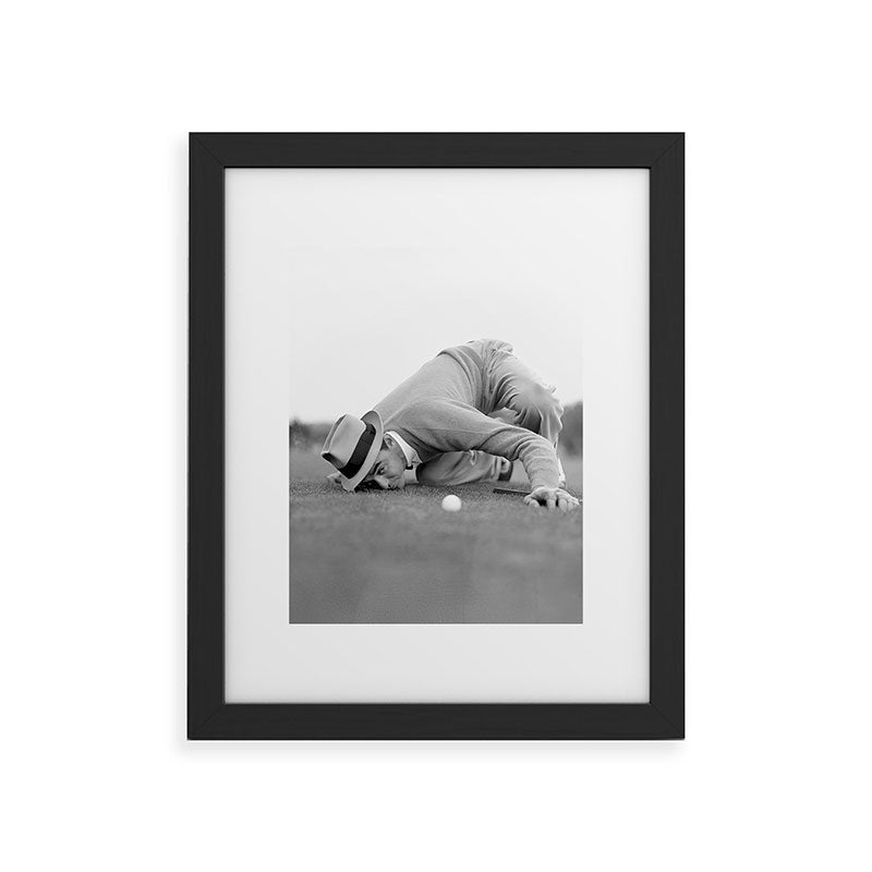 Eye to the ground on the 18th hole; golfing man eyes ball to measure distance to hole vintage black and white portrait photograph - photography - photographs poster Framed Art Print Gallery Image 41