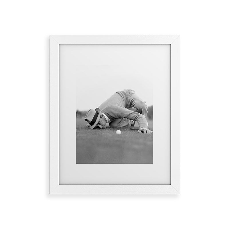 Eye to the ground on the 18th hole; golfing man eyes ball to measure distance to hole vintage black and white portrait photograph - photography - photographs poster Framed Art Print Gallery Image 74