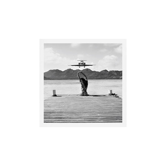 Steady as she goes girl in bikini on a dock with plane landing black and white photograph Art Print Gallery Image 2