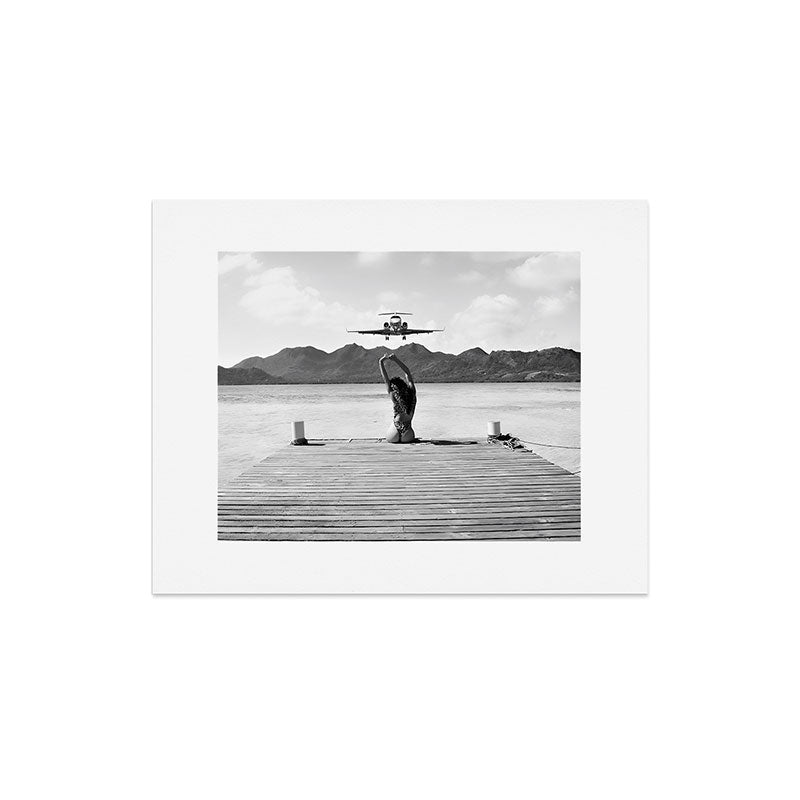 Steady as she goes girl in bikini on a dock with plane landing black and white photograph Art Print Gallery Image 6