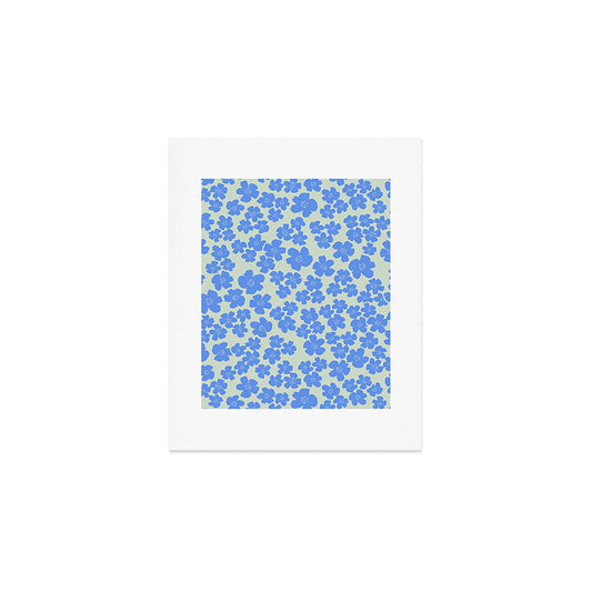 Blue flower blossom scatter on soft green Art Print Gallery Image 1